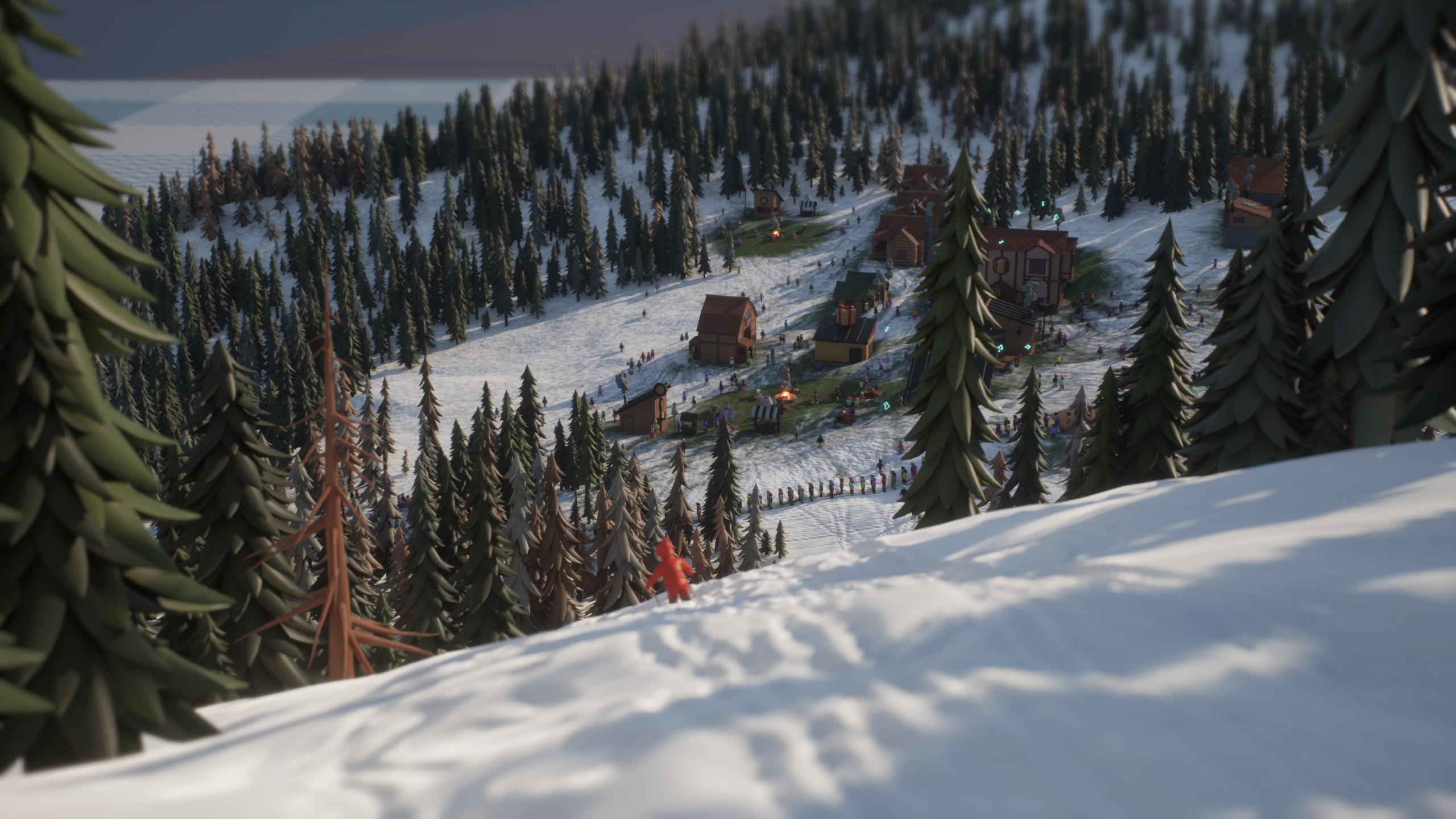 A freshly skied slope winding down toward a village